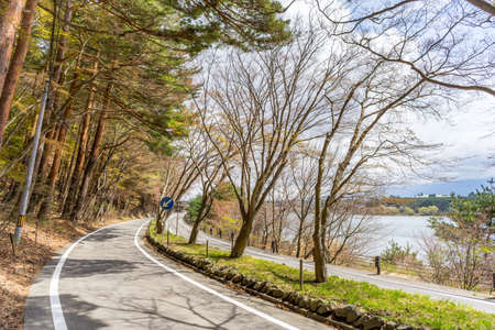 Beautiful scenary of Kawaguchiko lakeside at Momiju Tunnel in Japanの写真素材