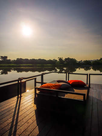 Sunrise in the morning by the river in Kanchanaburi, Thailandの写真素材
