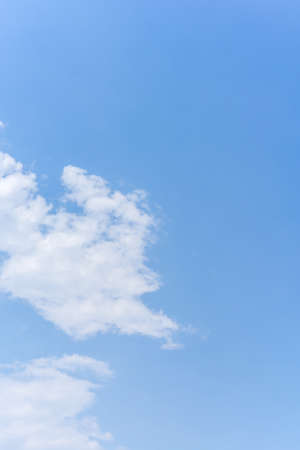 Beautiful clouds in the clear blue sky backgroundの写真素材