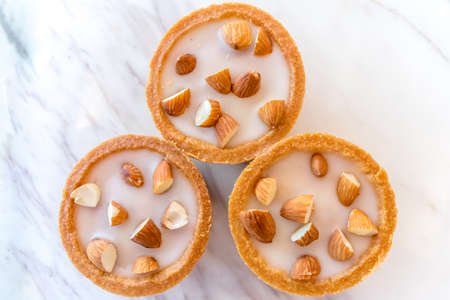 Dessert: Lime tart topped with almondの写真素材