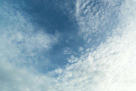 Beautiful clouds in the clear blue sky background, defocusedの写真素材