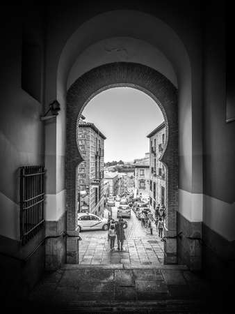 Travel concept: Go through the dark tunnel out to see the world. Dramatic, dark tone, and vignette effect applied to focus on the light that comes through the channel. No NR/Sharpen appliedの写真素材