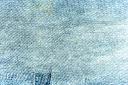 Texture of blue denim jeans for background useの写真素材