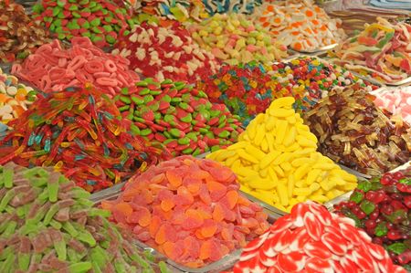Close-up of various candies in a marketの写真素材