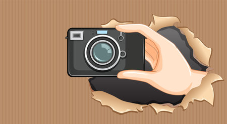 Hand holding camera through torn paper holeのイラスト素材