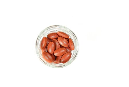 Red Pills in glass