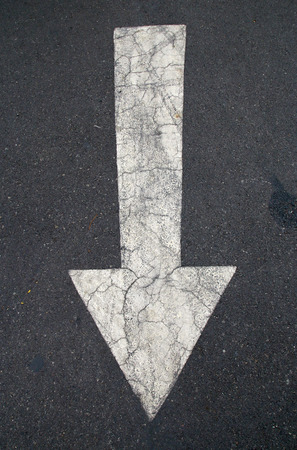 White arrow on Surface traffic の写真素材