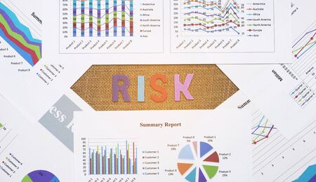 Business chart report with risk wordの写真素材