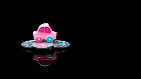 Miniature car model with stack coins,Loan Finance Conceptsの写真素材