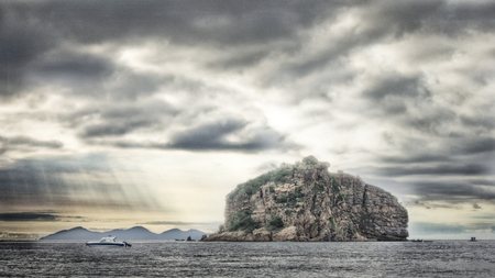 Mountain in sea at sunrise, Dalian, on of the most important city in Chinaの写真素材
