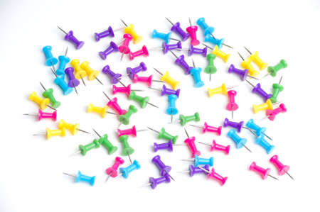 colorful push pin tacks isolated on white background.
