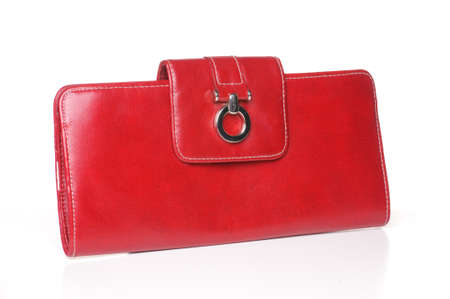 Red leather purse or clutcch on white background.の写真素材