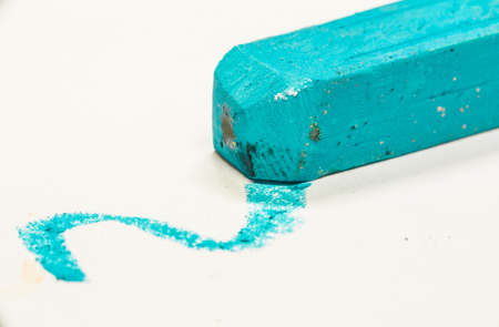 Macro shot of colored pastel on whiteの写真素材