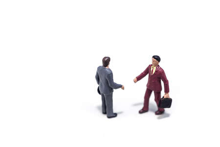 Two small buisness men making a dealの写真素材