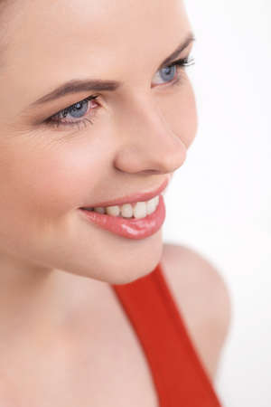 Beautiful young women. Close-up of beautiful young women isolated on whiteの写真素材