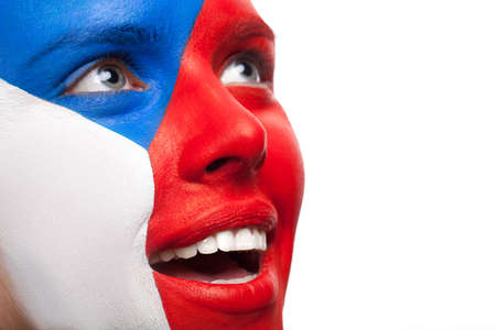 Close up of painted woman face. Isolated on white with toothy smileの写真素材