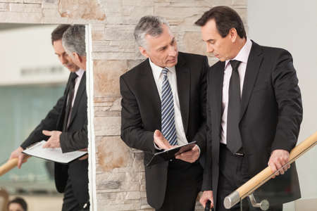 Two corporate professionals having discussionの写真素材