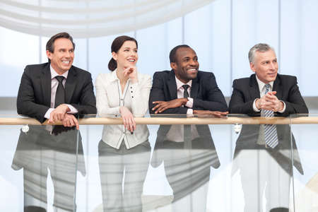 Business team smiling in business centerの写真素材