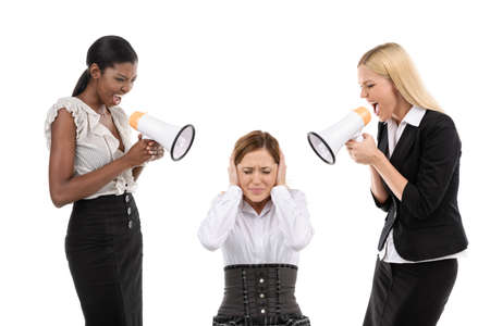 Two businesswoman shouting at his colleagueの写真素材