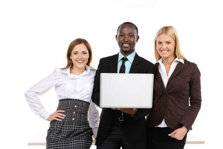 Business team using laptop. Looking at camera