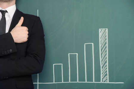 Bar chart with businessman.の写真素材