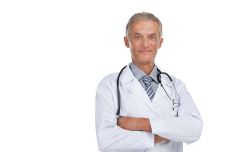 Confident old man looking at camera. Having crossed arms and isolated on whiteの写真素材