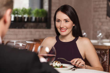 Night out at the restaurant. Mature couple having lunch at the restaurantの写真素材