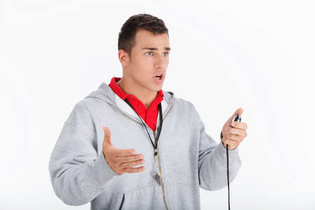 Displeased trainer. Coach with stopwatchの写真素材