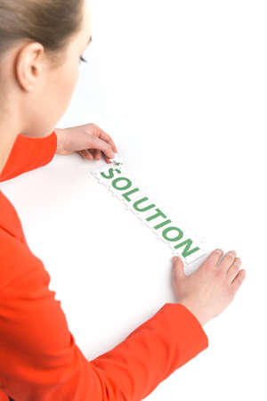Woman placing last piece of Puzzle. Girl with puzzle Idea isolated on white background