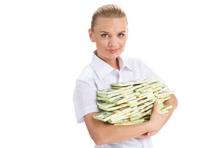young businesswoman holding money and smiling. Cheerful businesswoman standing with dollars on white backgroundの写真素材