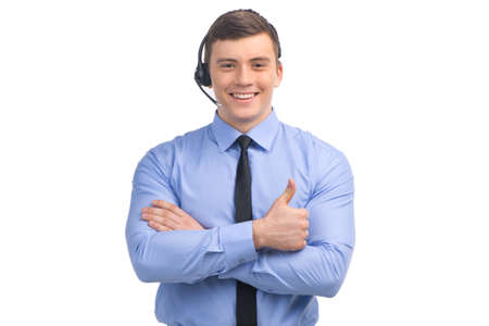 handsome technical support operator working on white. の写真素材