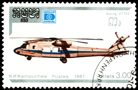 Cambodia - CIRCA 1987: A stamp printed in the Cambodia shows Helicopter Boeing UTTAS, series Havnia 87, circa 1987の写真素材