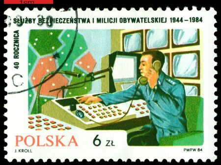 POLAND  - CIRCA 1984: a stamp printed by Poland shows Centre of the checking, 40 th anniversary Polish militia, circa 1984の写真素材