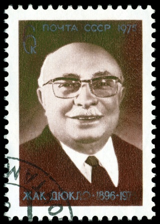  USSR - CIRCA 1975: A Stamp printed in the USSR  shows portrait Jacques Duclos, circa 1975.の写真素材