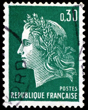 FRANCE - CIRCA 1967:  A stamp printed in France,  shows  Marianne - Symbol of the French republic, circa 1967.の写真素材