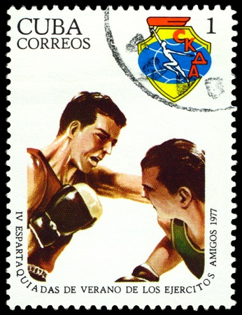 CUBA- CIRCA 1977: a stamp printed by  Cuba, shows boxers, 4th Military Spartakiad, series, circa 1977の写真素材
