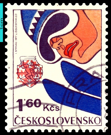 CZECHOSLOVAKIA  - CIRCA 1977: a stamp printed by  Czechoslovakia , shows  jumps from a springboard.  6th Winter Spartakiad of Socialist Countries' Armies in 1977.  series, circa 1977の写真素材