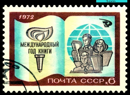 USSR - CIRCA 1972: A Stamp printed in the USSR shows Book, Torch, Children and Globe, circa 1972