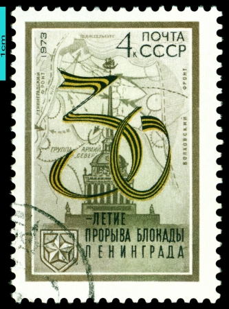 USSR- CIRCA 1973: a stamp printed by USSR, shows Map and Admiralty Tover. Leningrad. 30th anniv.  breakout of the blocade Leningrad , circa 1973の写真素材