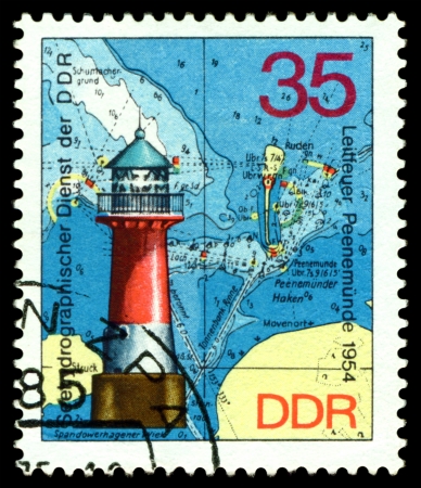 GERMANY - CIRCA 1975  stamp printed by Germany, shows Lighthouse Peenemunde  1954 , Series Lighthouses, Maps and Nautical Charts, circa 1975  の写真素材