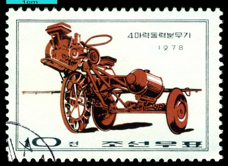 DPR KOREA - CIRCA 1978  a stamp printed by  DPR Korea , shows  Light tractor, Farm  Machines, circa 1978のeditorial素材