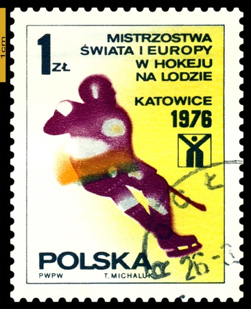 POLAND - CIRCA 1976  a stamp printed by Poland shows  Hockey  players  World and Europe Hockey cup in Katowice and Lodzie, circa 1976のeditorial素材