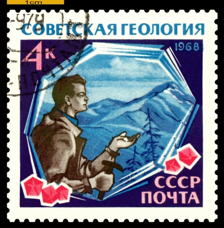 USSR- CIRCA 1968: a stamp printed by USSR, shows  portrait of the geologist. Prospecting, Crystals,  Gavel,  circa1968のeditorial素材