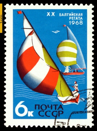 USSR - CIRCA 1968: a stamp printed by USSR shows   sailfish, Baltic Regatta, European youth sports competitions, circa 1968のeditorial素材