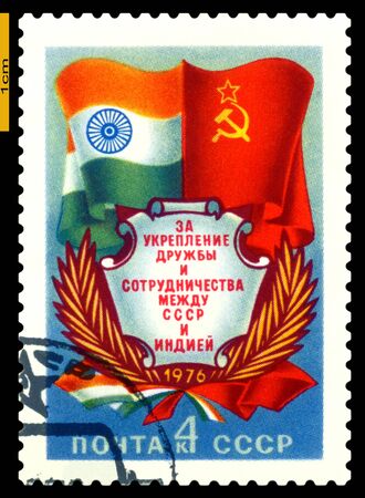 USSR- CIRCA 1976: a stamp printed by USSR, shows  Flags and Symbols  of USSR and  India, Friendship  and cooperation,  USSR and  India, circa 1976.のeditorial素材