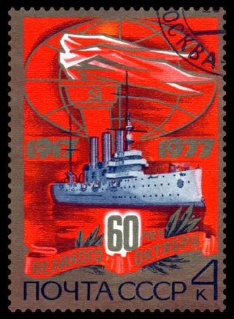 RUSSIA - CIRCA 1977: A Stamp printed in the Russia  shows  Cruiser Aurora, 60th  anniversary October Revolution,  circa 1977のeditorial素材