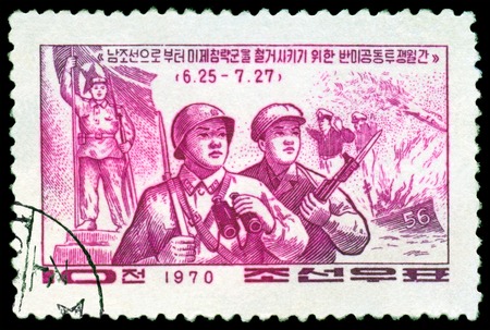 DPR KOREA - CIRCA 1970  a stamp printed by  DPR Korea , shows Soldier and partisan, circa 1970 の写真素材