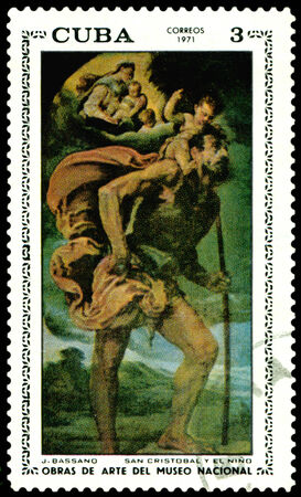 Cuba - CIRCA 1971  a stamp printed by Cuba  shows a picture of artist J Bassano   San Cristobal and the child , circa 1971の写真素材