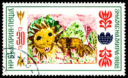 BULGARIA- CIRCA 1982: a stamp printed by Bulgaria, shows Flags peace, Children Playing, circa 1982のeditorial素材