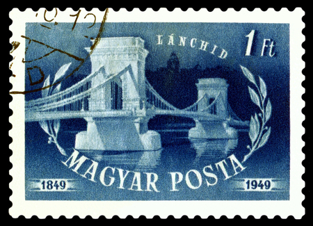 STAVROPOL, RUSSIA - APRIL 28, 2016: a stamp printed by Hungary shows  Chain Bridge, Budapest, hundred years of opening , circa 1949の写真素材